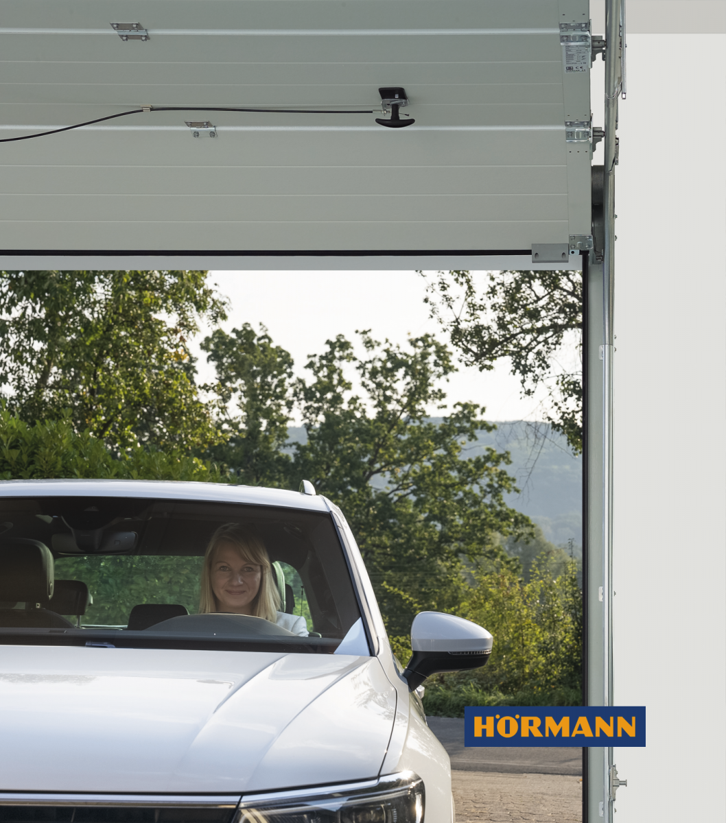 Usa sectionala automata de garaj cu sistem de deblocare din exterior - Hörmann